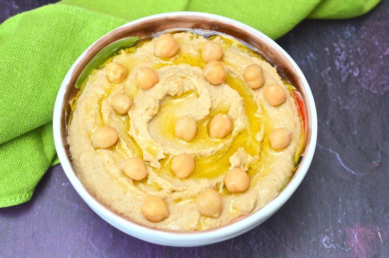 A bowl of traditional hummus bi tahini.