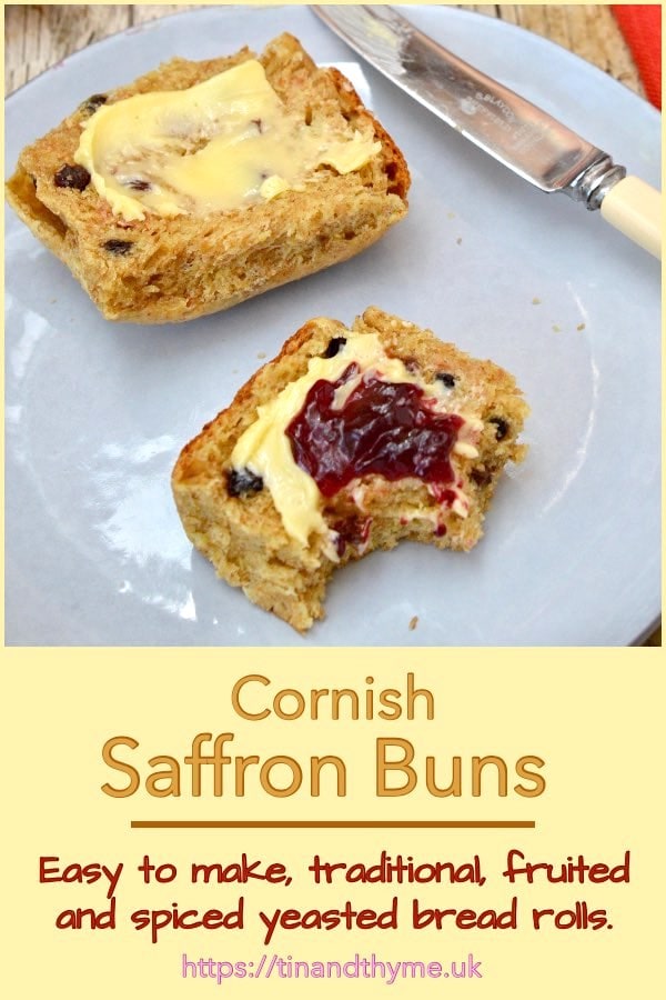 Cornish saffron bun spread with butter and jam.