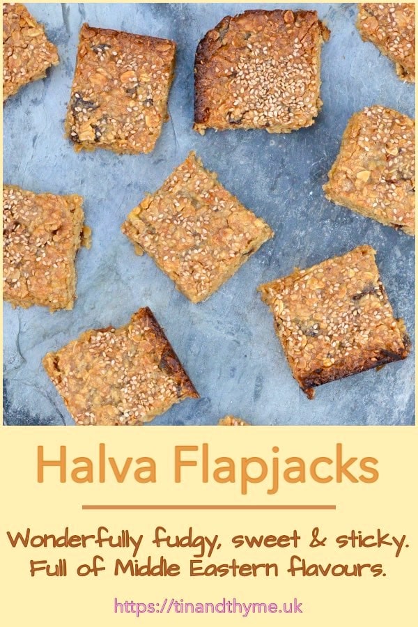 Halva flapjacks lying on a slate.