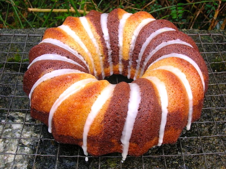 Chocolate Orange Marble Bundt Cake with orange icing.