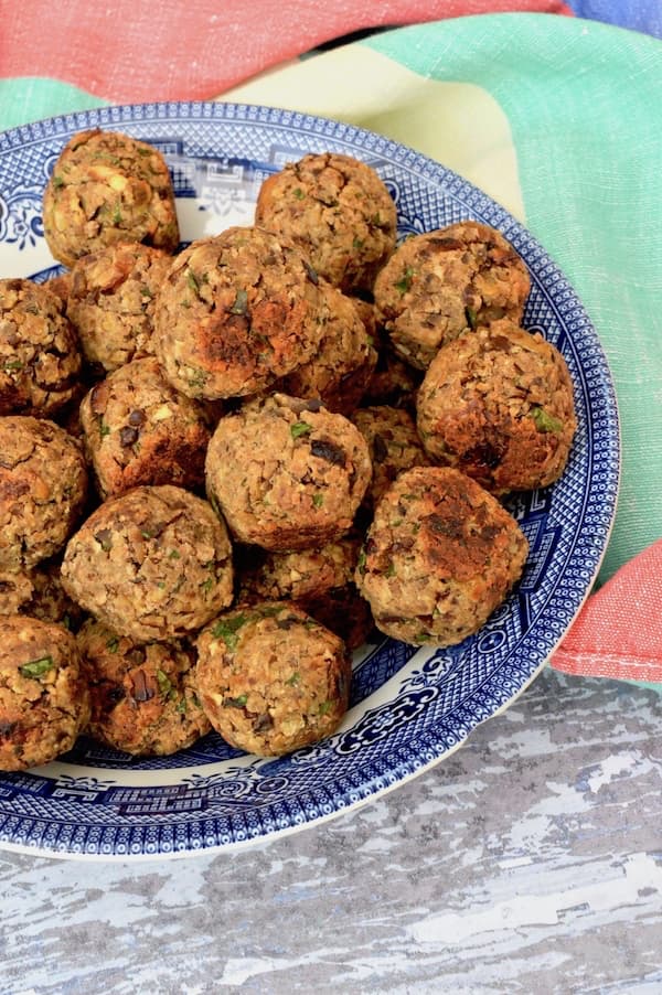 Chestnut and tempeh vegan stuffing balls in a bowl.