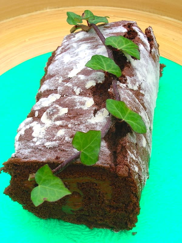 Chocolate Log with a Whipped Boozy Dark Chocolate Ganache Filling.