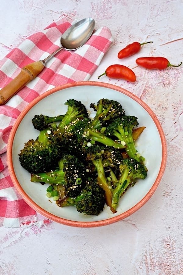 A bowl of sticky chilli broccoli.