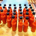 Bottles of homemade chilli sauce.