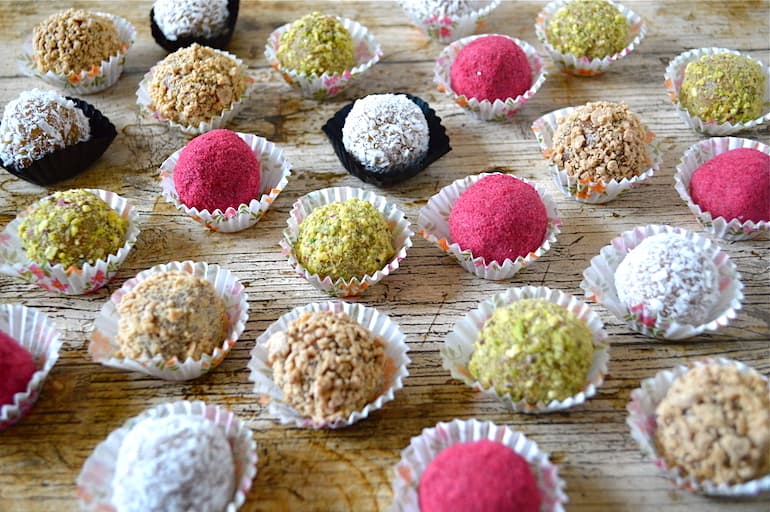Christmas Bliss Balls. Four varieties in paper cases.
