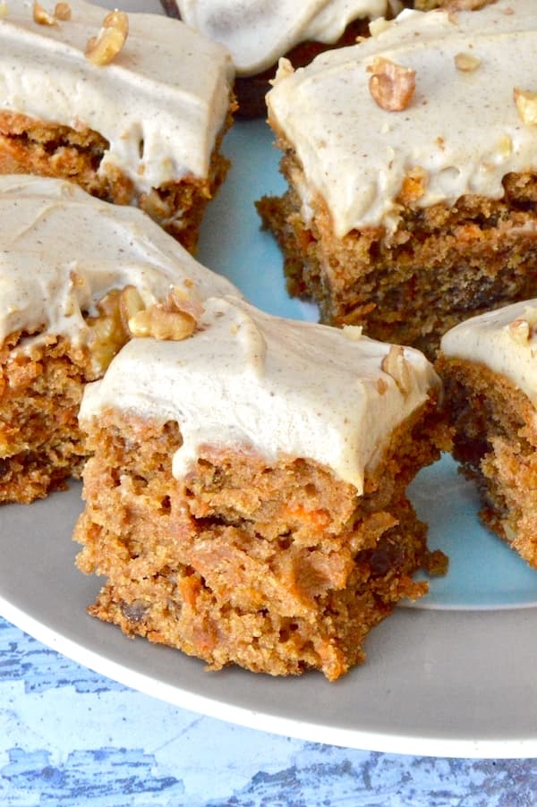 Slabs of healthy vegan carrot cake on a plate.