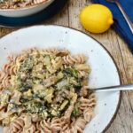 Fresh-tasting vegetarian pasta dish with mushrooms and Swiss chard in a garlic and lemon creamy sauce.