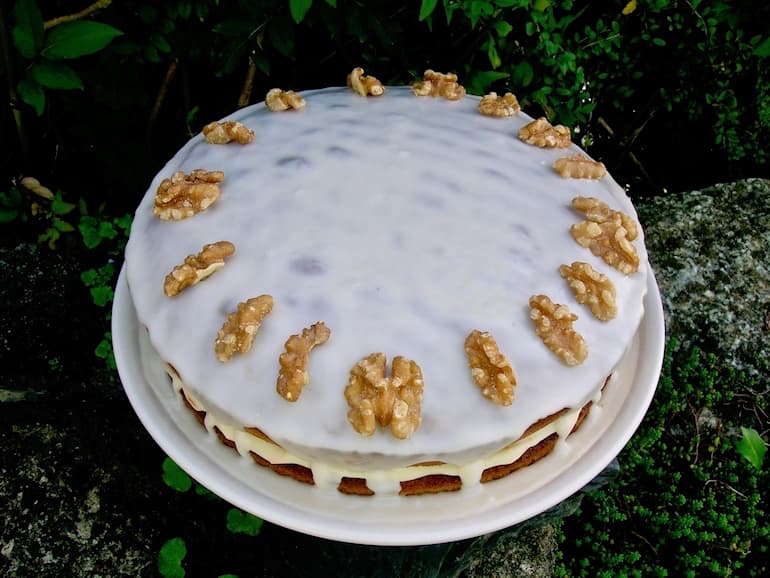 Orange and Earl Grey Cake decorated with walnuts.