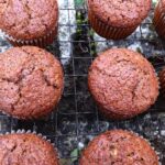 Wensleydale Cheese Chocolate Muffins cooling on a wire rack.