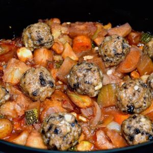 Slow Cooker Vegetable Stew with Mushroom Dumplings in the pot.