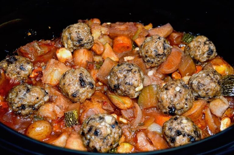 Slow Cooker Vegetable Stew with Mushroom Dumplings in the pot.