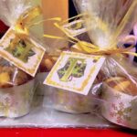 Individual homemade mini Dundee cakes all wrapped up for Christmas.