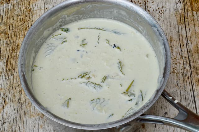 Mint leaves steeped for a couple of hours in cream.
