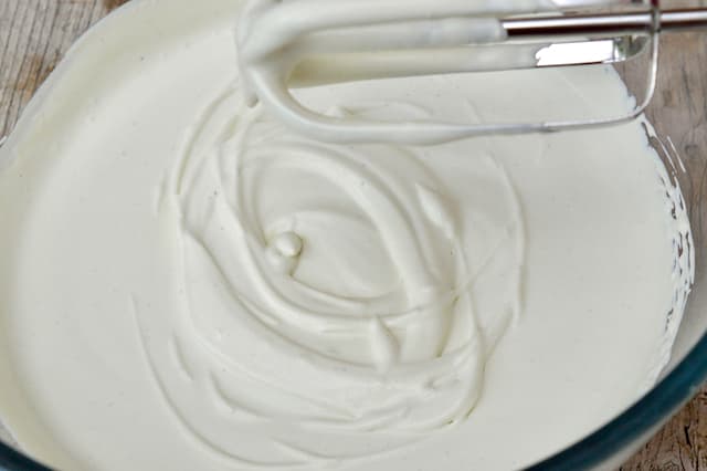 A bowl of whipped minty cream.