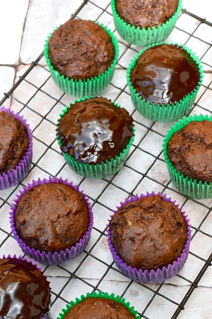 Vegan chocolate courgette cupcakes. Some coated with ganache, some not.