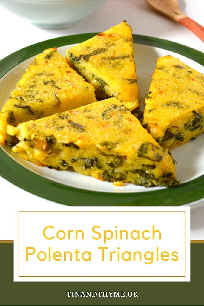 A plate with four corn spinach polenta triangles.