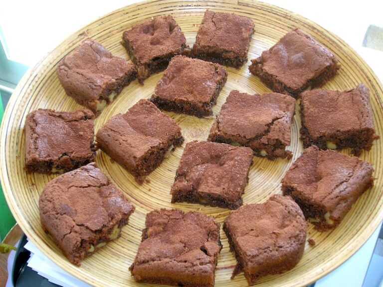Bamboo platter of dark and white chocolate squares.