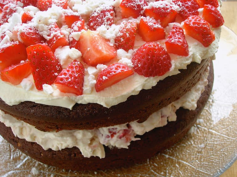 Eton Mess chocolate cake with strawberries, cream and meringue.