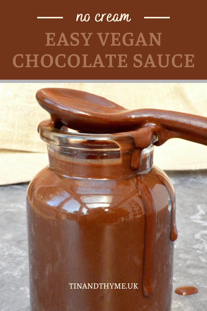 Easy vegan chocolate sauce made with champagne. Sauce covered spoon on top of pot.