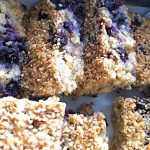 Close up of some homemade blueberry and white chocolate flapjacks.