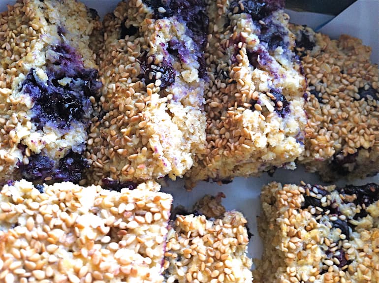 Close up of some homemade blueberry and white chocolate flapjacks.