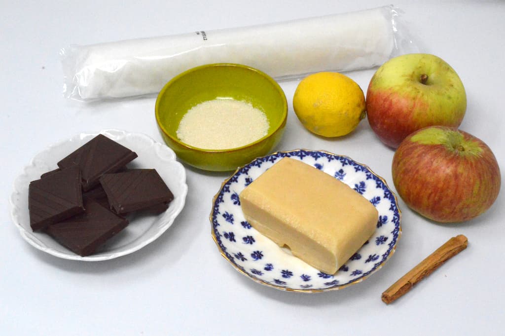 Ingredients needed to make apple almond and chocolate pastries.