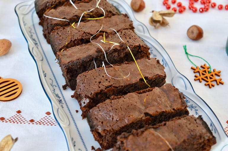 A line of festive mincemeat brownies on a plate.