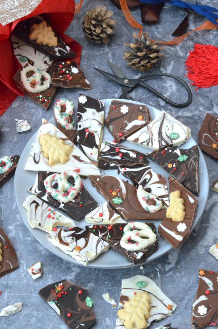 A plate of festive swirled chocolate bark pieces.