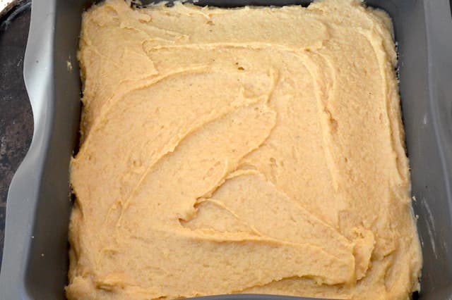 Raw sponge batter in silicone mould ready for baking.