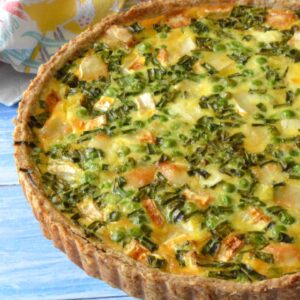 Partial view of baked vegetarian spring quiche.