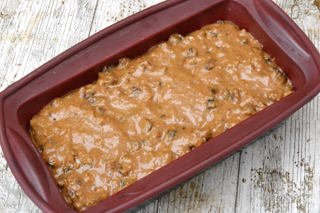Fruit cake batter in silicone loaf mould.