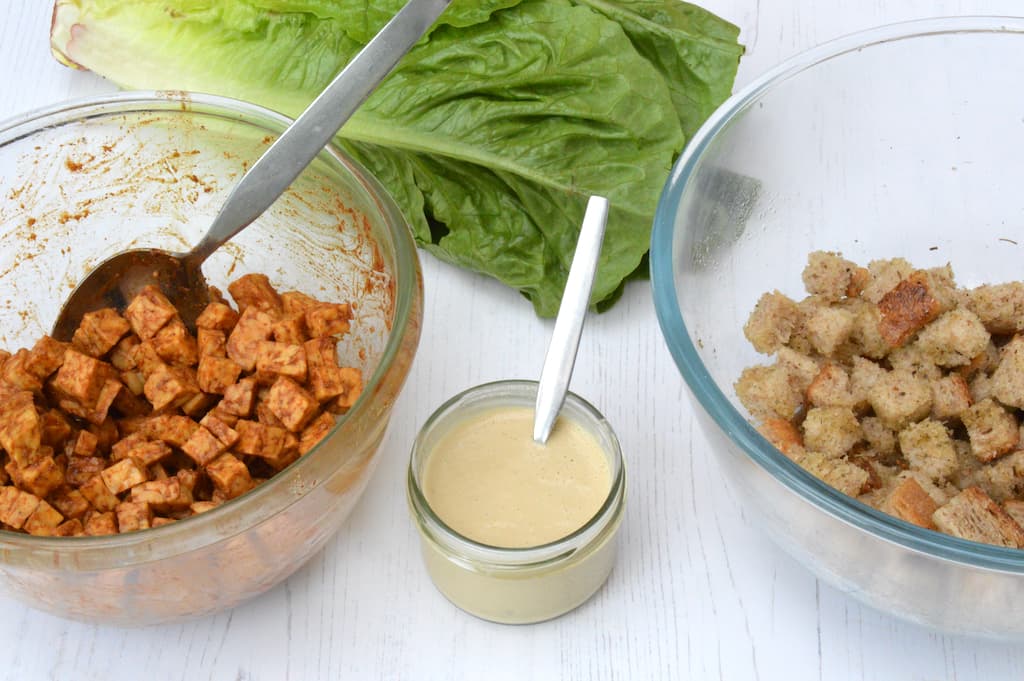 Ingredients needed to make tempeh caesar salad.