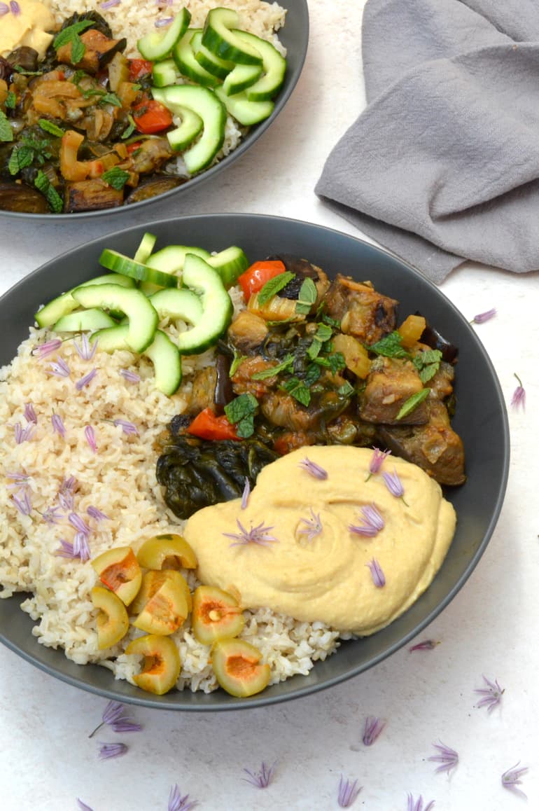 Aubergine rice bowl with second one behind.