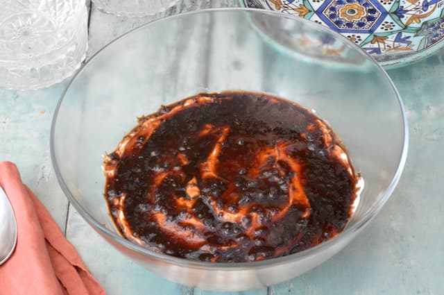 Brown sugar dissolved in dessert bowl.