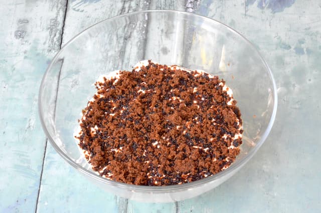 Brown sugar sprinkled over dessert.