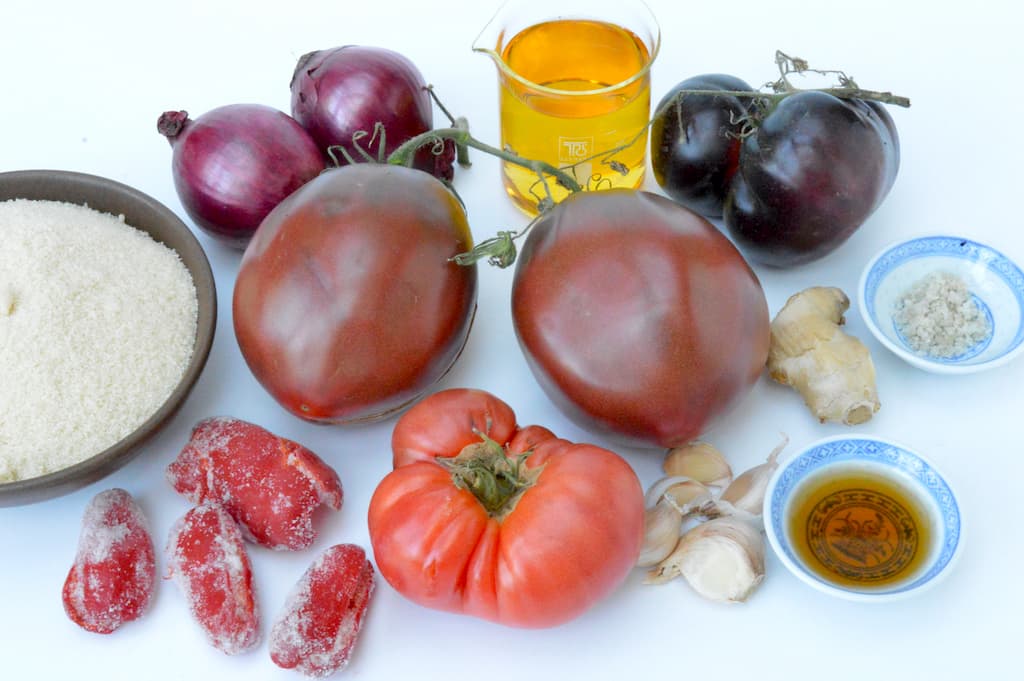 Ingredients needed to make chilli and tomato jam.