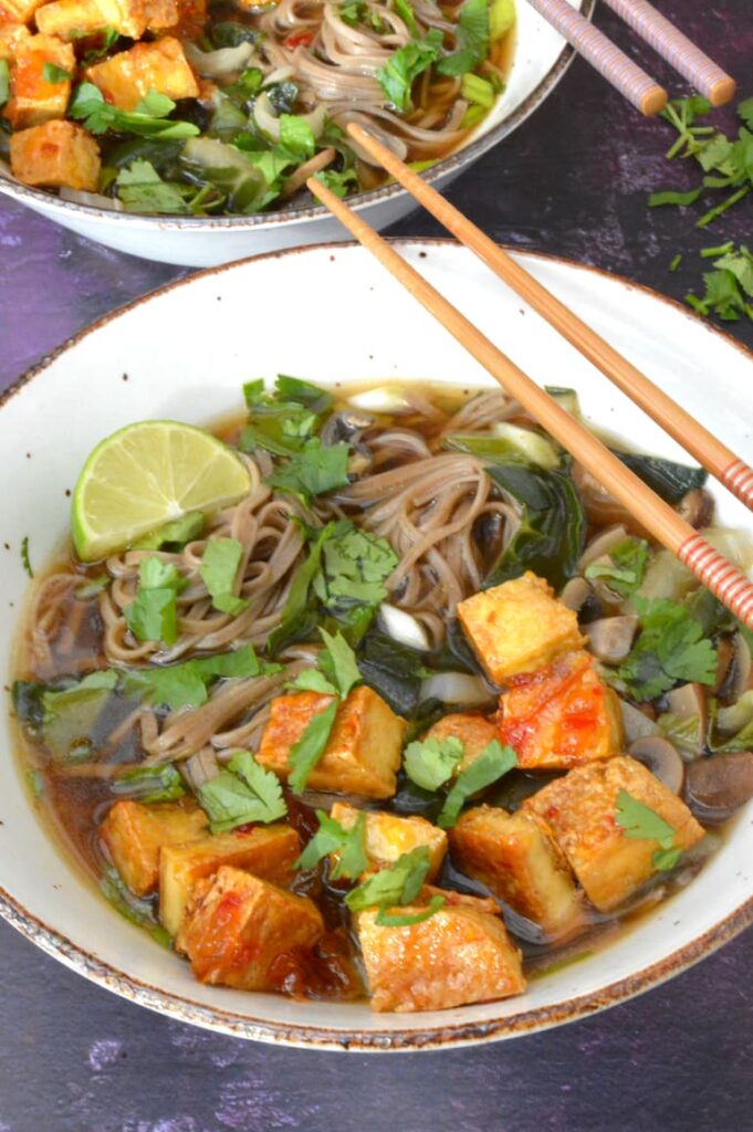 Two bowls of mushroom miso soup with hot marmalade tofu.