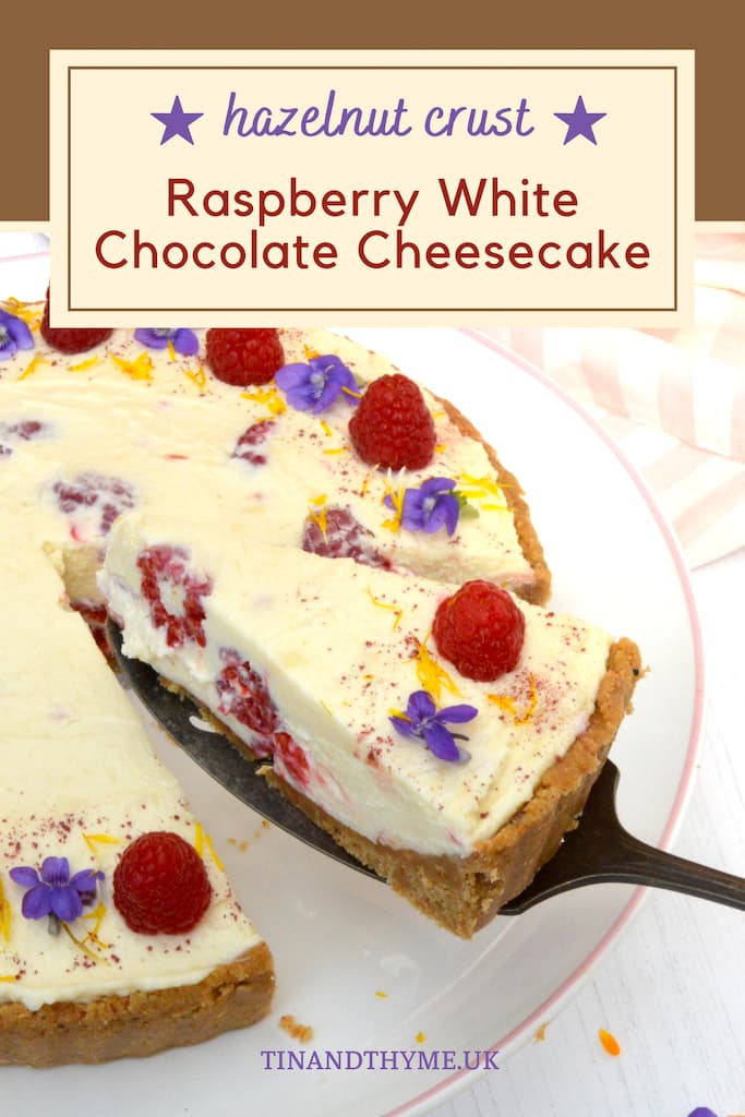 Pin showing slice of raspberry white chocolate cheesecake being served.