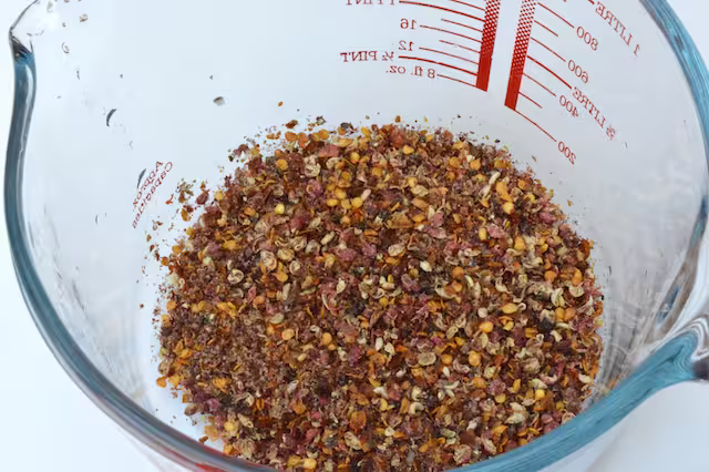 Dried pepper mix in heatproof jug.