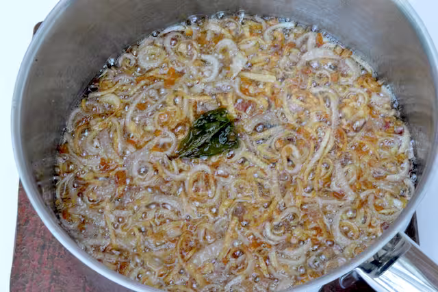 Shallots brown enough to remove from pan of oil.