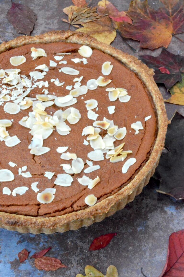Medlar tart made with wholemeal pastry and topped with flaked almonds.