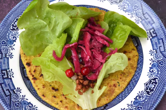 Keema paratha topped with lettuce, red cabbage and leftover mince.