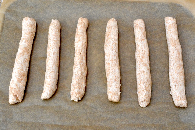 2-ingredient yoghurt dough sticks on baking tray.