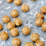 Coffee and walnut whey protein balls ready for eating or storing.