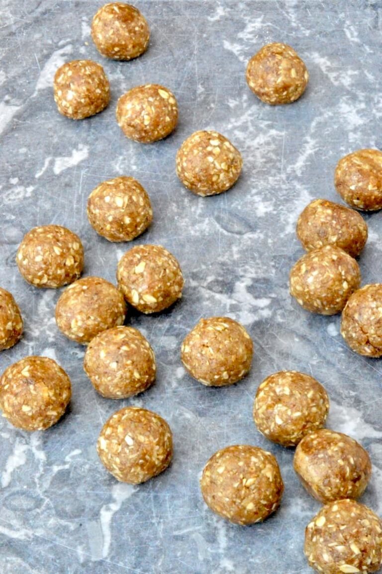 Coffee and walnut whey protein balls ready for eating or storing.
