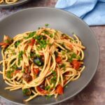 Bowl of homemade vegan pasta alla puttanesca.