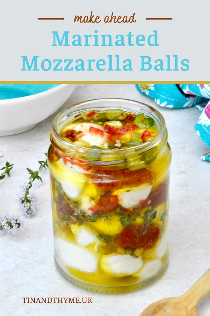 Open jar of marinated mozzarella balls.