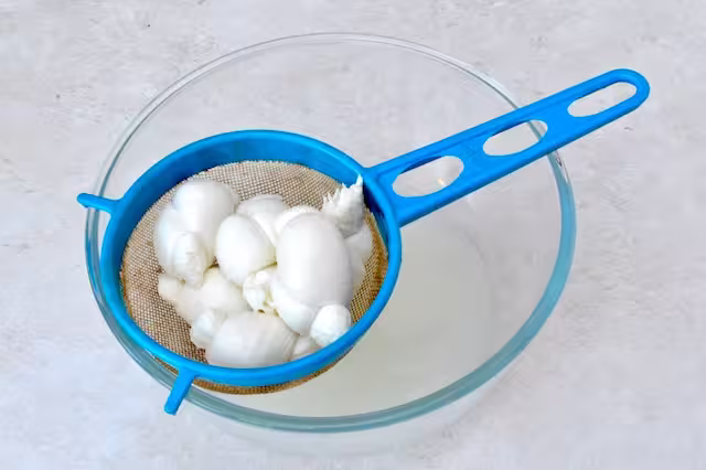 Nodini draining in a sieve.