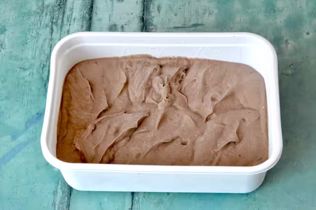 Tub of frozen roasted green tea ice cream.