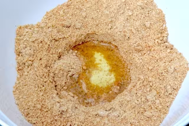 Well of egg white in dry dough mix.
